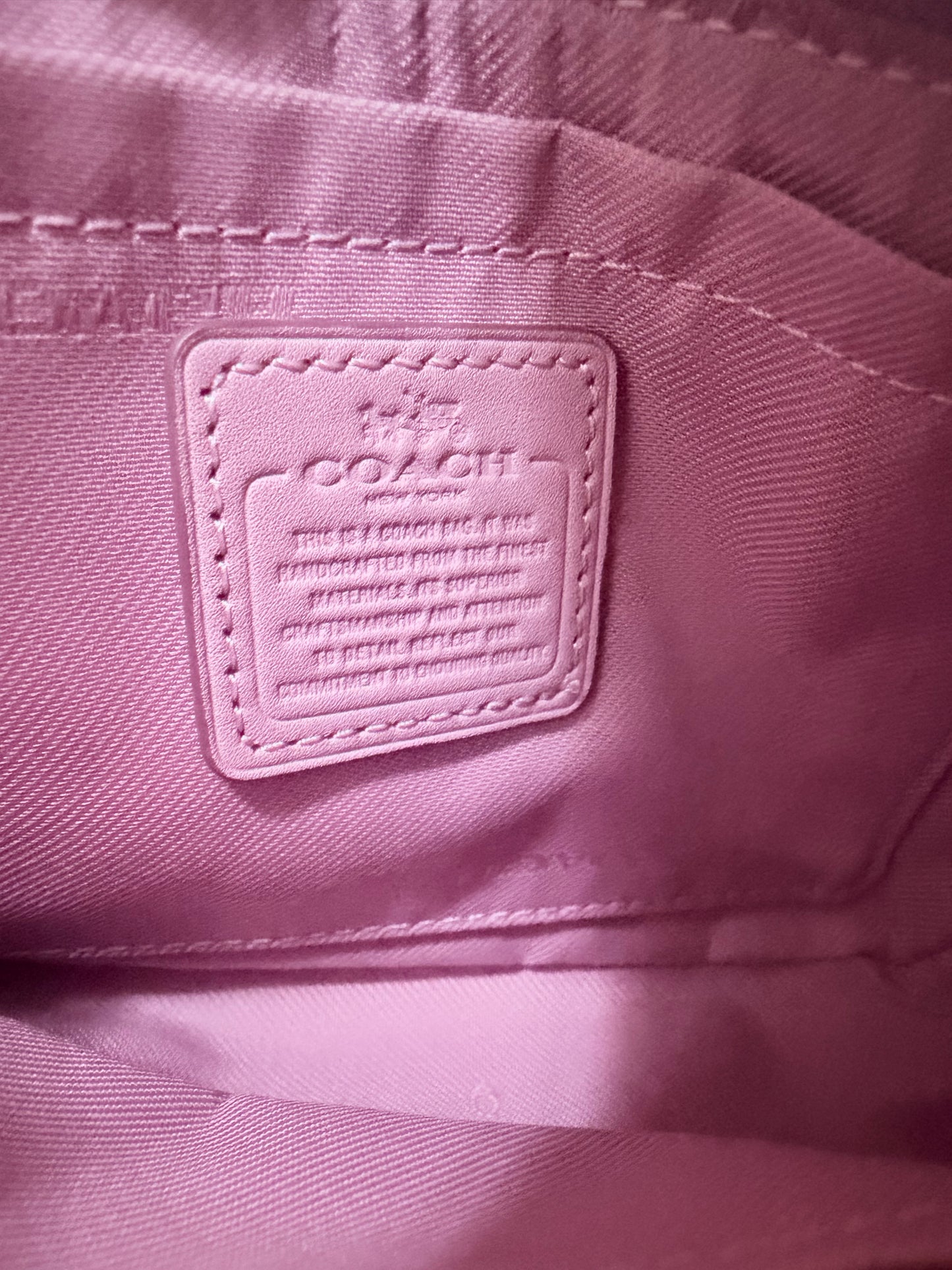 Coach mini bag in a pink color