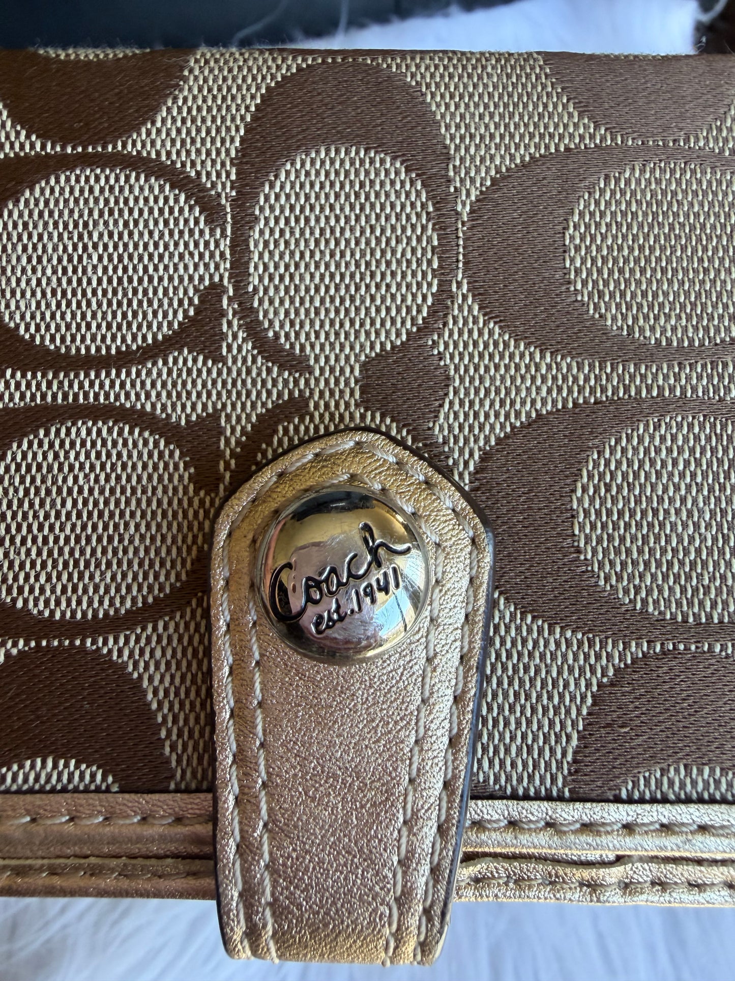 Coach signature canvas wallet with gold metallic trim