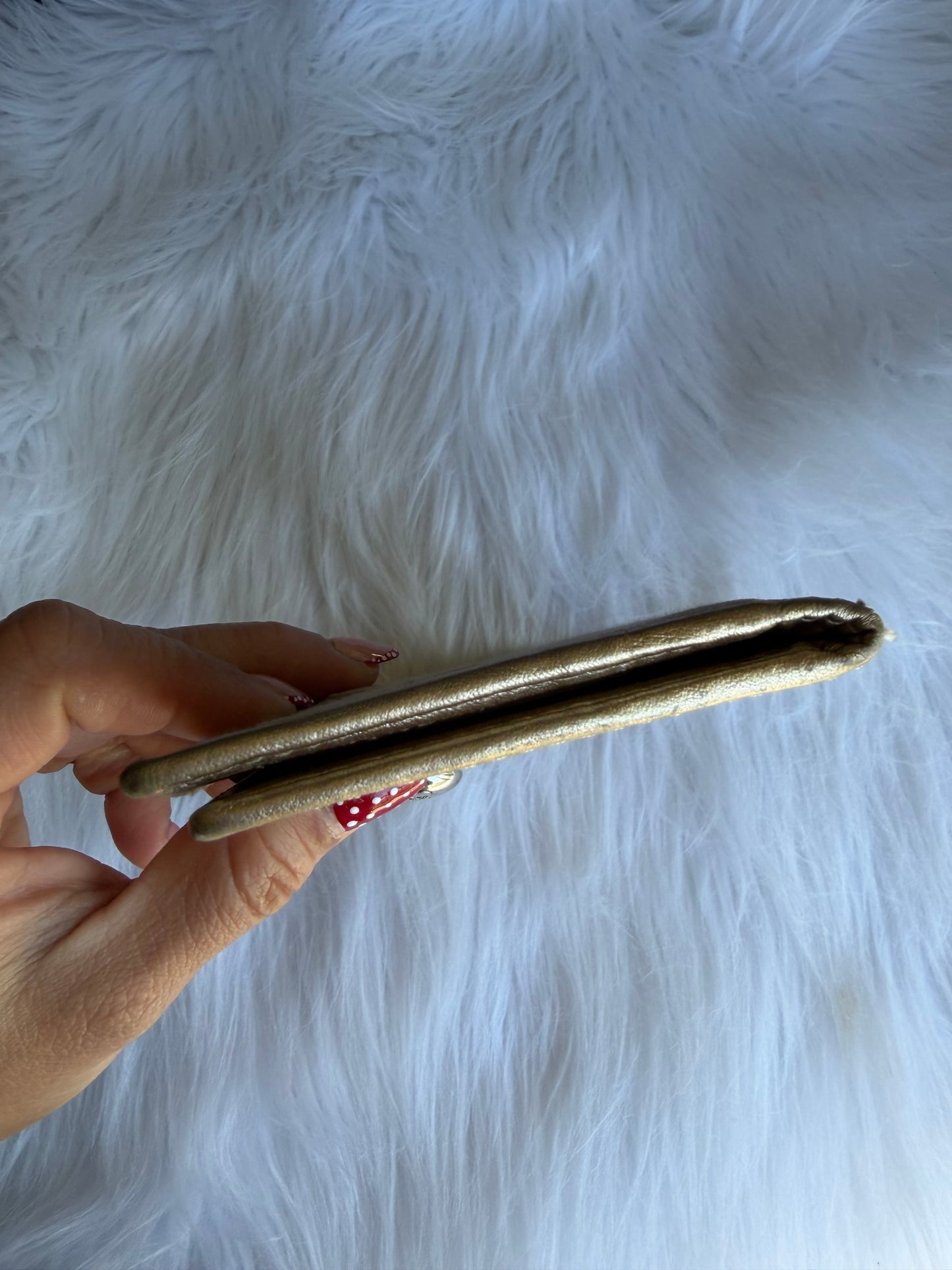 Coach signature canvas wallet with gold metallic trim