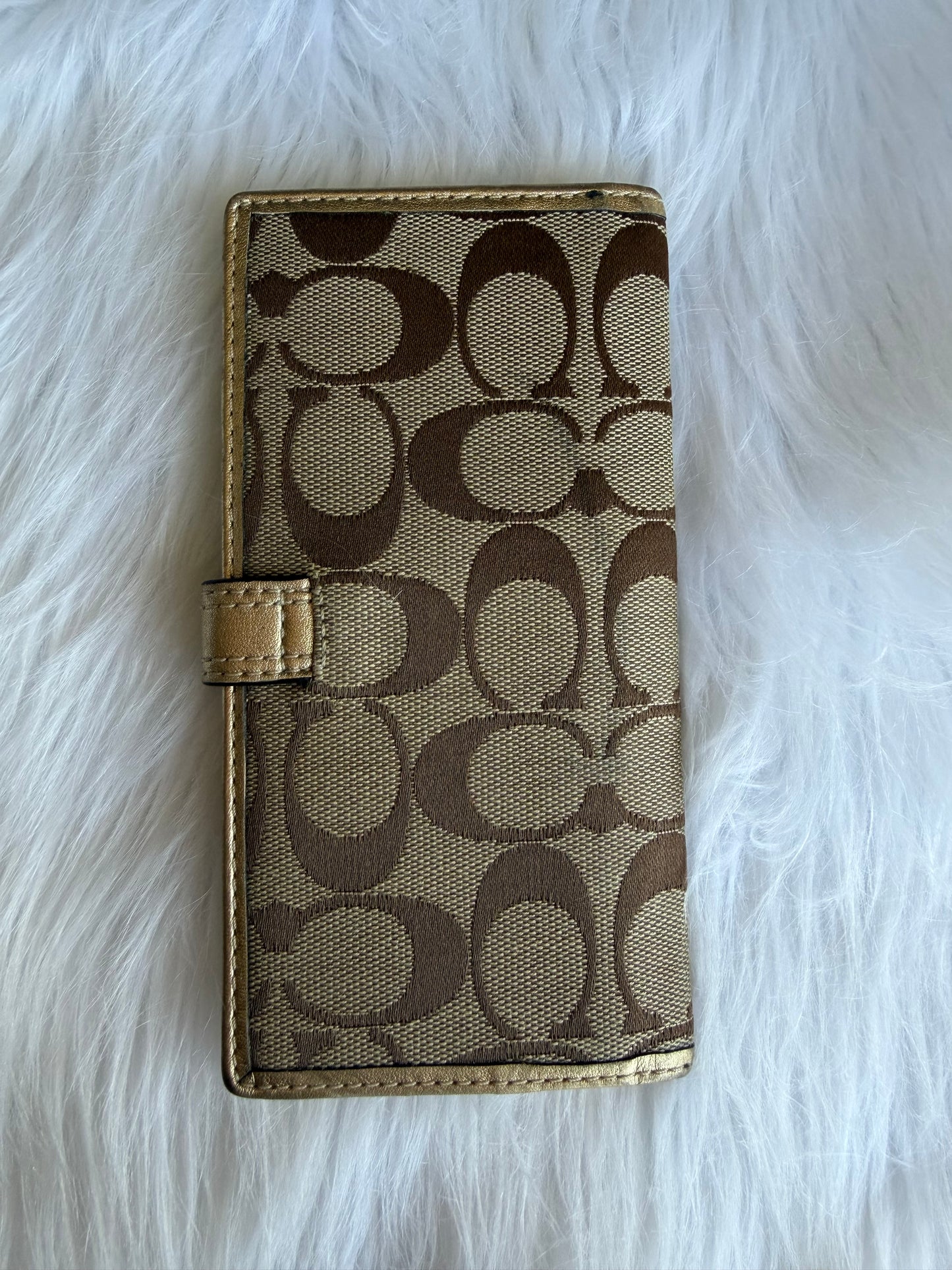 Coach signature canvas wallet with gold metallic trim