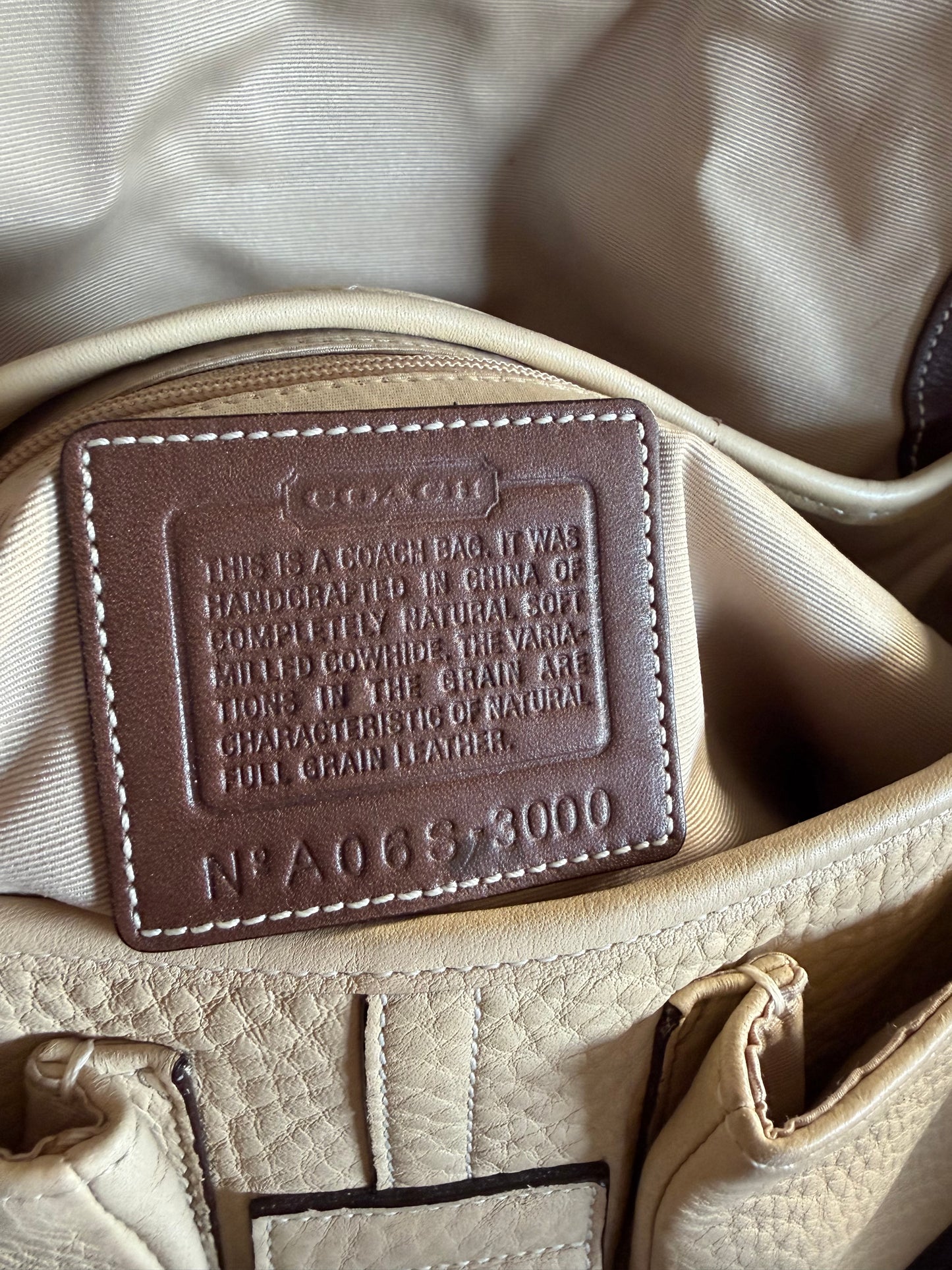 Coach Soho buckle in cream or beige